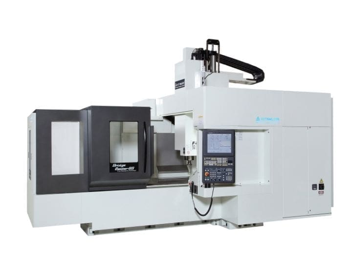Kitamura Bridgecenter 8G CNC machine with an enclosed workspace and control panel.