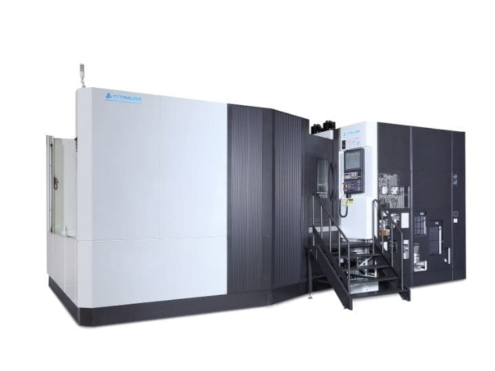 Large Kitamura CNC machine with an enclosed workspace and elevated control panel.